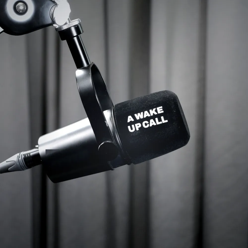 Branded foam cover on a boom arm